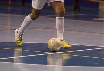 Futsal player in the sports hall
