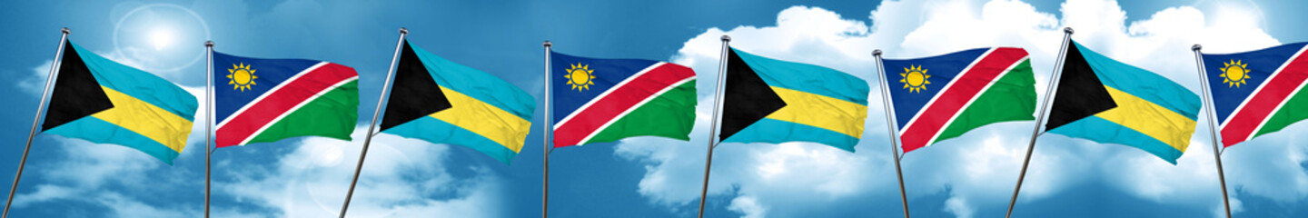 Bahamas flag with Namibia flag, 3D rendering