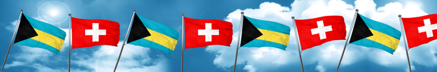 Bahamas flag with Switzerland flag, 3D rendering