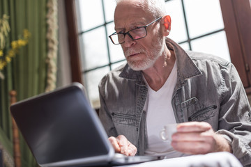Businessman working at home, hard light effect