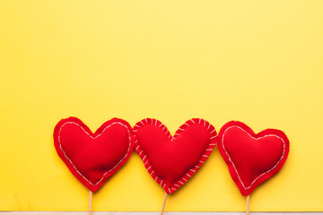 tissue hearts on a yellow background