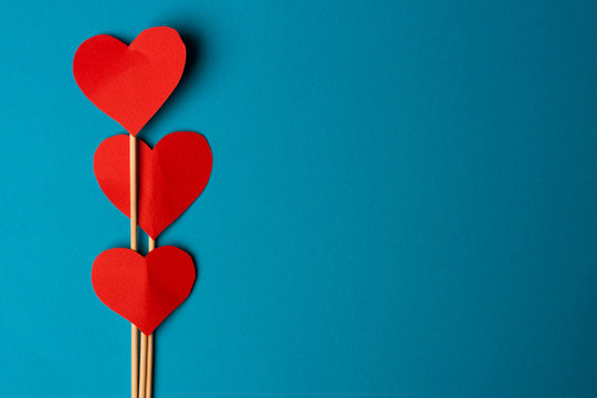 blue background free place red paper heart