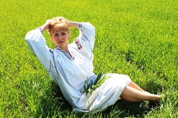 girl in a field in spring	