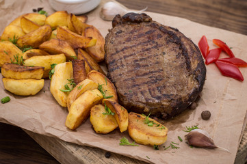 Rustic grilled beefsteak with french fries