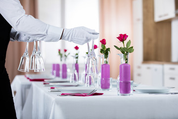 Waiter Setting Wedding Table