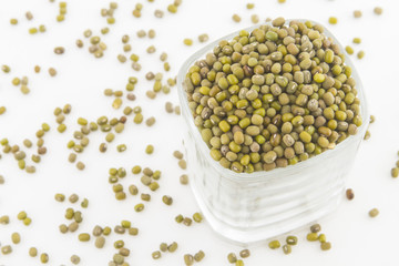 Mung bean on wood and isolated on white background
