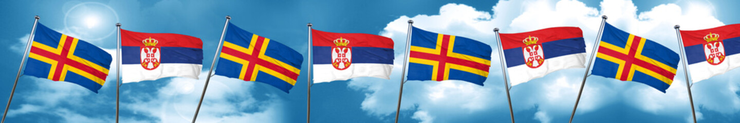 aland islands with Serbia flag, 3D rendering