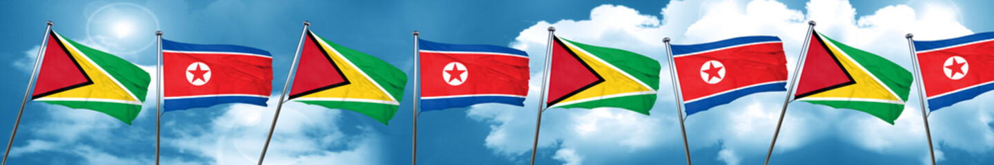 Guyana flag with North Korea flag, 3D rendering