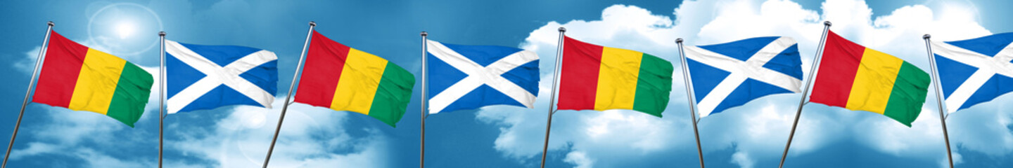 Guinea flag with Scotland flag, 3D rendering