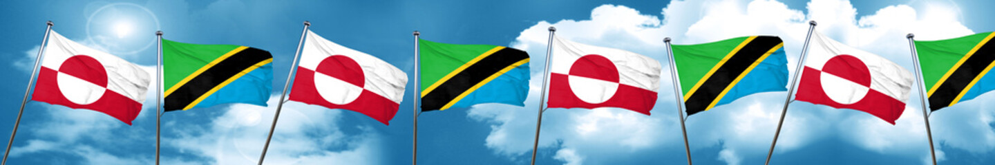 Fototapeta na wymiar greenland flag with Tanzania flag, 3D rendering