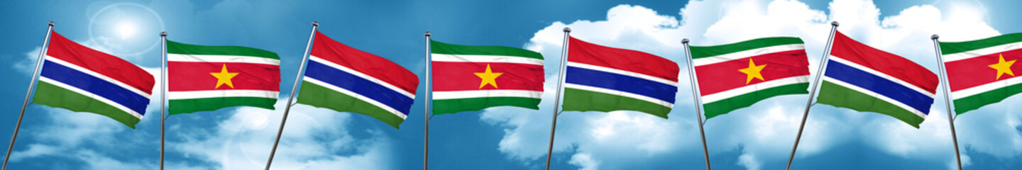Gambia flag with Suriname flag, 3D rendering