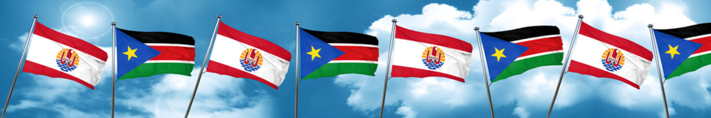 french polynesia flag with South Sudan flag, 3D rendering