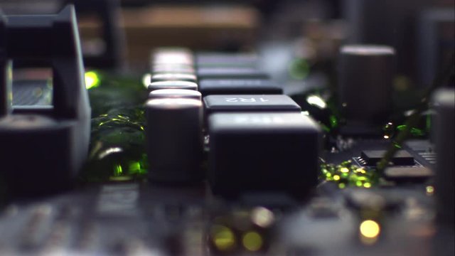 Tracking macro shot of a flooding circuit board.