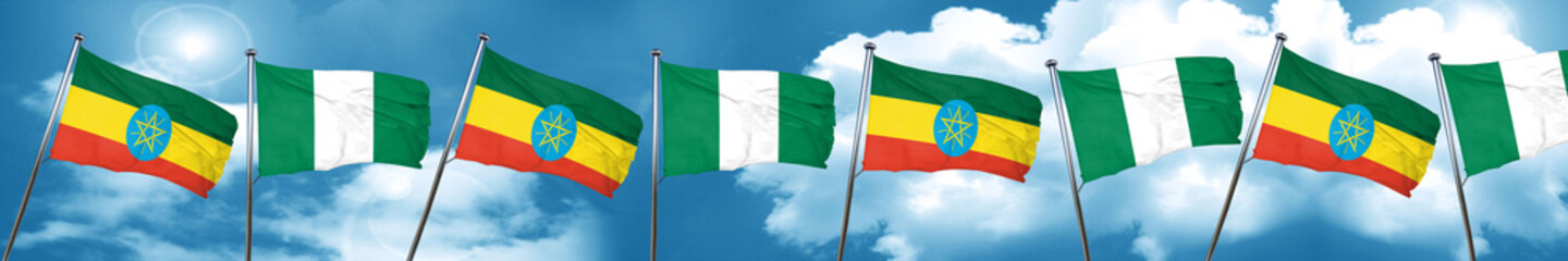 Ethiopia flag with Nigeria flag, 3D rendering