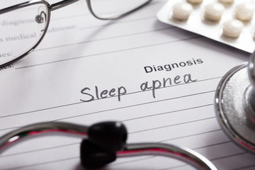 Diagnosis Sleep Apnea Word On Paper With Drugs And Stethoscope