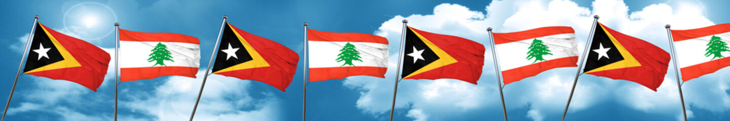 east timor flag with Lebanon flag, 3D rendering