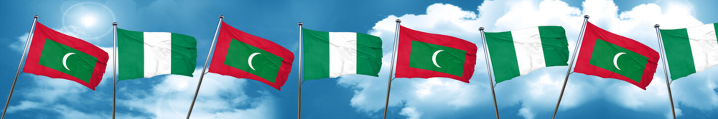 Maldives flag with Nigeria flag, 3D rendering