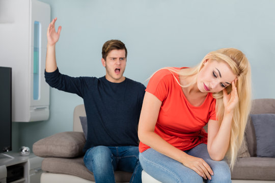 Man Shouting To His Wife At Home