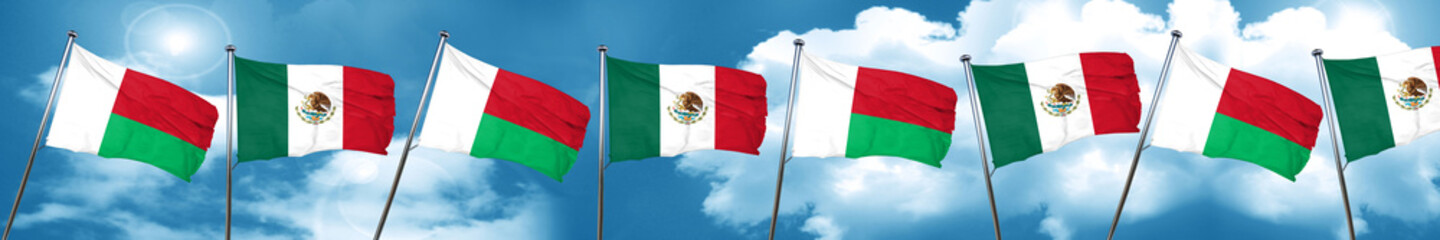 Madagascar flag with Mexico flag, 3D rendering