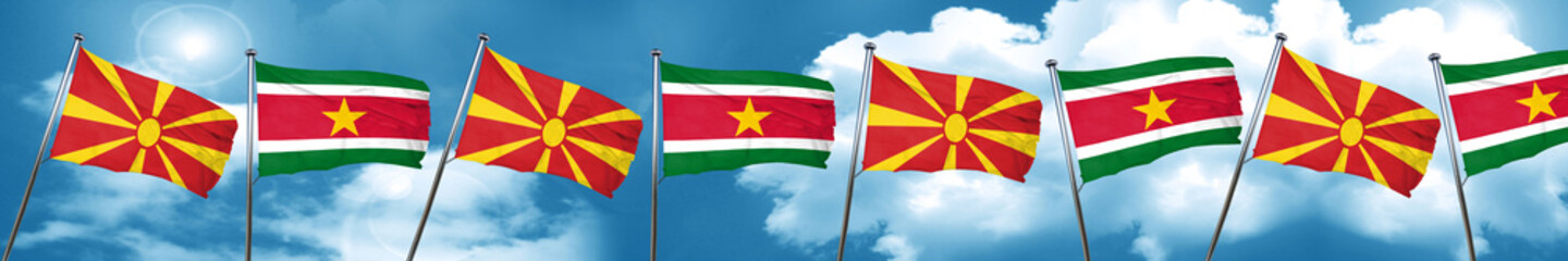 Macedonia flag with Suriname flag, 3D rendering