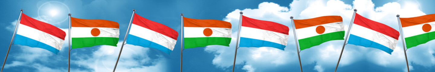 Luxembourg flag with Niger flag, 3D rendering