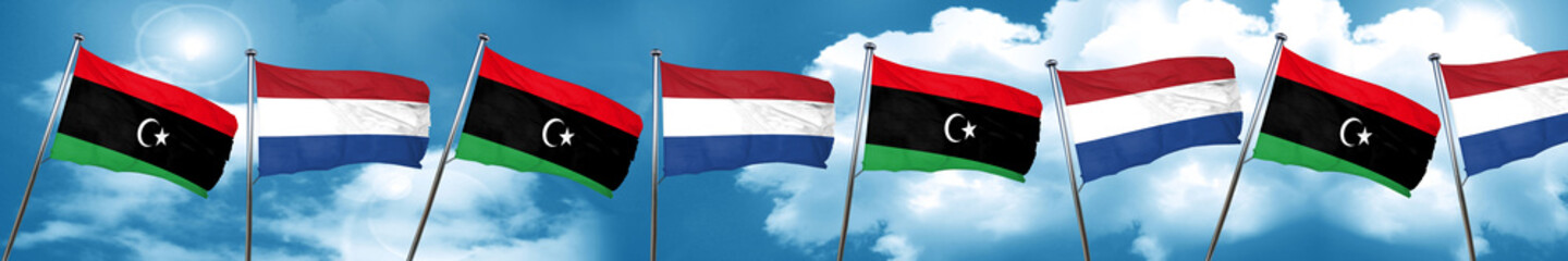 Fototapeta na wymiar Libya flag with Netherlands flag, 3D rendering