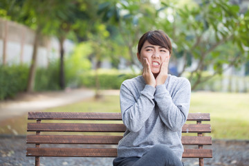 Woman has toothache coppy space