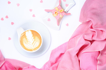 Coffee with pink scarf. Valentines concept. White background. Li