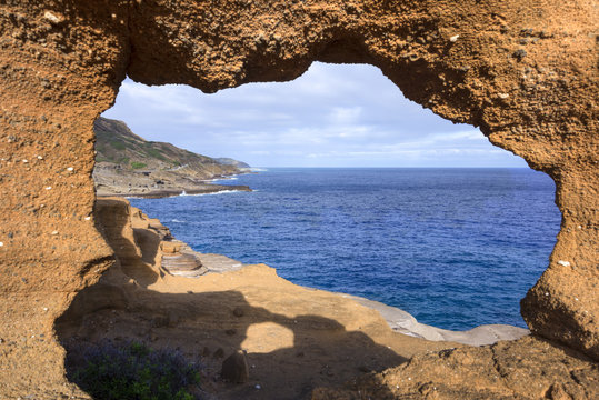 Ocean view through rock window