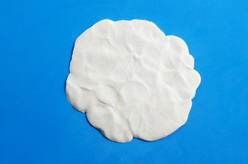 plasticine texture isolated on blue background