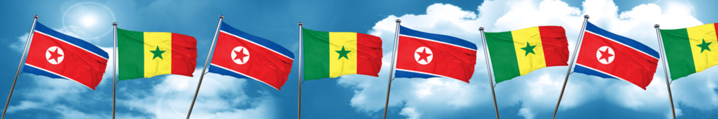 North Korea flag with Senegal flag, 3D rendering