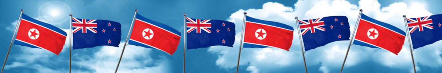 North Korea flag with New Zealand flag, 3D rendering