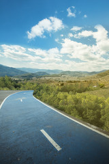 Road with Mountain view at sunlight