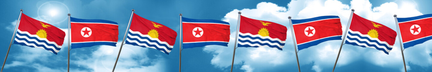 Kiribati flag with North Korea flag, 3D rendering