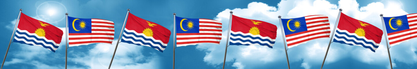 Naklejka premium Kiribati flag with Malaysia flag, 3D rendering