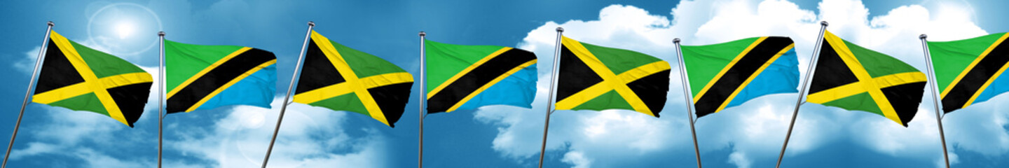 Jamaica flag with Tanzania flag, 3D rendering