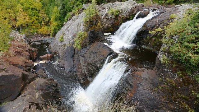Gabbro Falls is a tiered waterfall plunging over a basalt rock cliff on the Black River of Michigan's beautiful western Upper Peninsula.