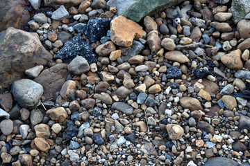 Pebbles by the beach looking down