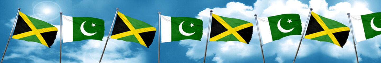 Jamaica flag with Pakistan flag, 3D rendering