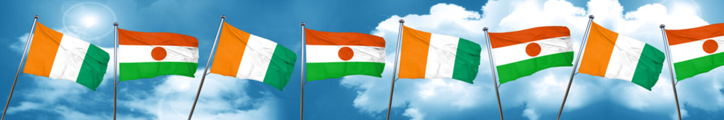 Ivory coast flag with Niger flag, 3D rendering