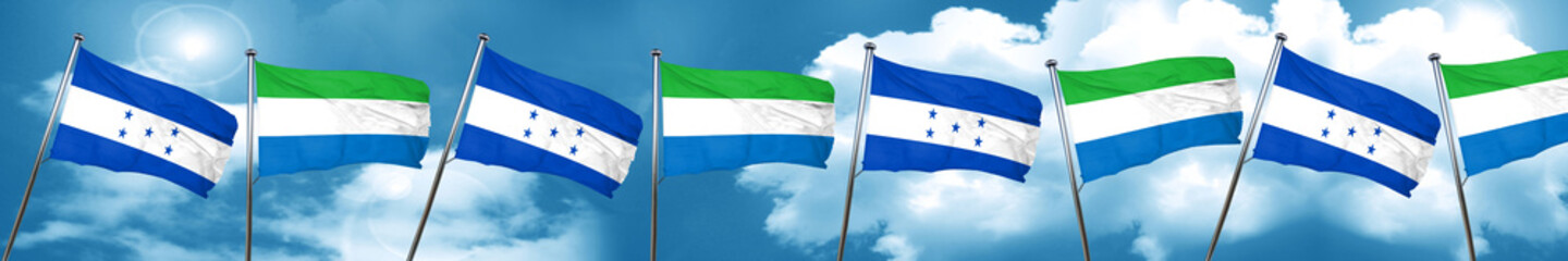 Honduras flag with Sierra Leone flag, 3D rendering