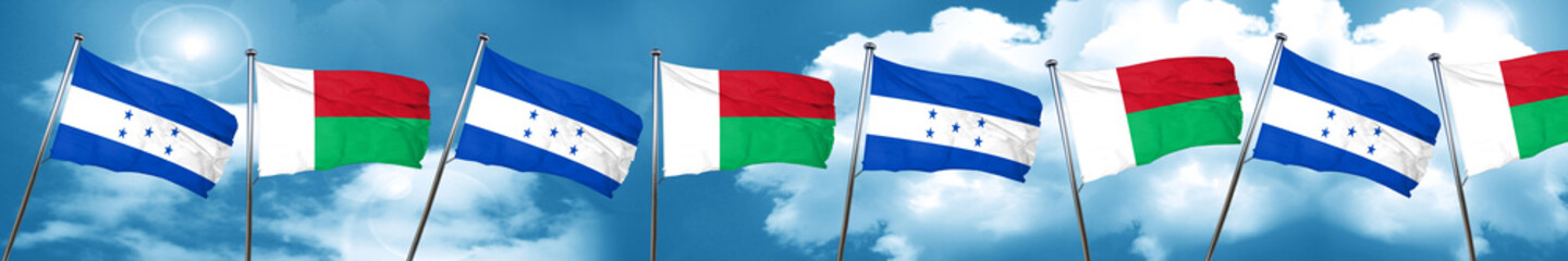 Honduras flag with Madagascar flag, 3D rendering