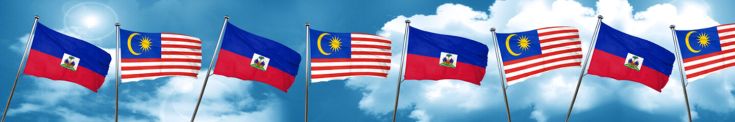 Fototapeta na wymiar Haiti flag with Malaysia flag, 3D rendering