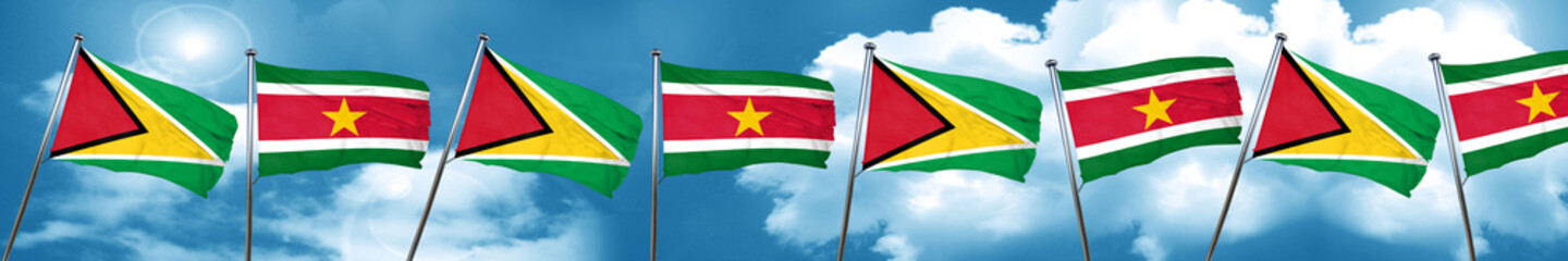 Guyana flag with Suriname flag, 3D rendering