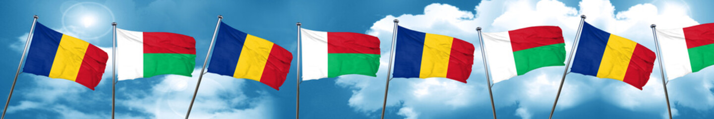 Romania flag with Madagascar flag, 3D rendering