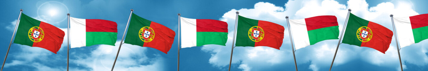 Portugal flag with Madagascar flag, 3D rendering