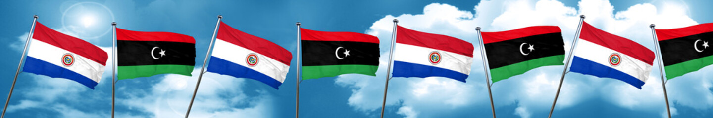 Paraguay flag with Libya flag, 3D rendering