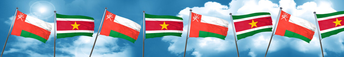 Fototapeta na wymiar Oman flag with Suriname flag, 3D rendering
