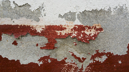 Cracked concrete vintage wall background, grunge red background