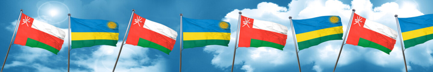 Fototapeta na wymiar Oman flag with rwanda flag, 3D rendering